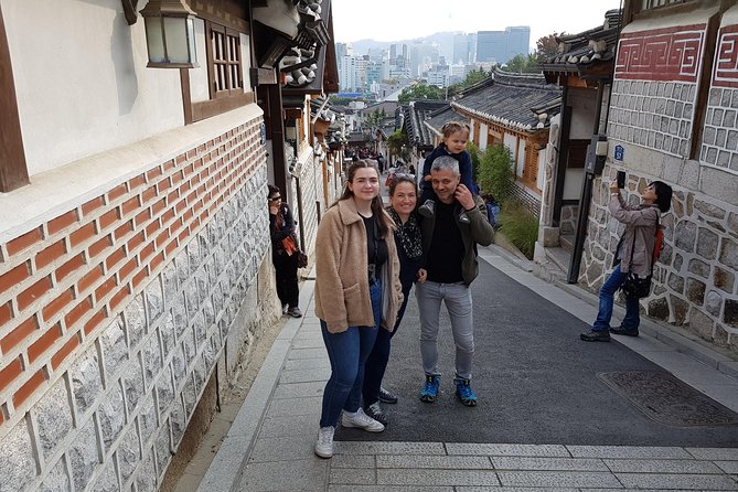 7 Day Essential Korea Tour(Seoul, Nami, DMZ, Andong, Gyeongju, Busan_Meal Incl.) - Day 6: Busan’s coast, markets, and war memorial