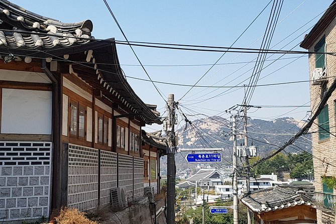 Best Walking Tour to Gyeongbok Palace Bukchon Hanok Village - Starting near Gwanghwamun and the King Sejong statue