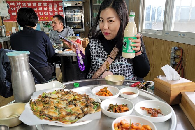 Busan Seafood Tour : Oyster village Tour with Oyster cuisines - Walking through a working oyster village