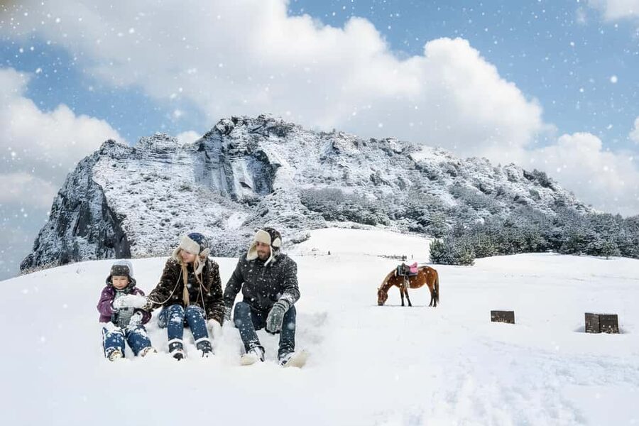 East Jeju: Day Tour with Seongsan Peak & Haenyeo Performance - Ilchul Land opens the day underground