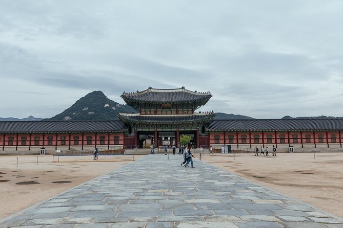 Highlights & Hidden Gems With Locals: Best of Seoul Private Walking Tour - Meeting point, walking demands, and cancellation terms