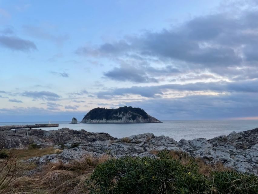 Jeju: Seogwipo City Walking Tours with Sunset - Saeyeongyo Bridge and the changing evening light