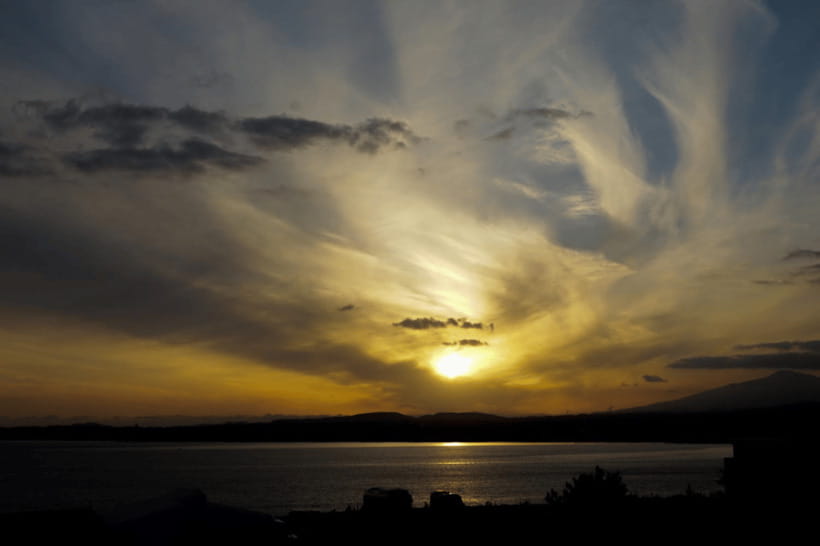 Jeju: Sunset Tour Olle Trail Walking Tour with Hotel Pickup - Aewol Cafe Street at sunset