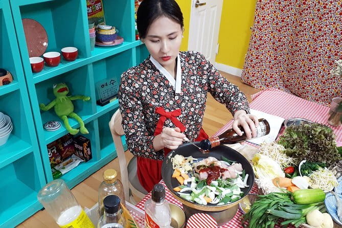 Korean Cooking Class with Grocery Shopping at Seoul Local Market - Cooking three Korean staples in a cozy studio