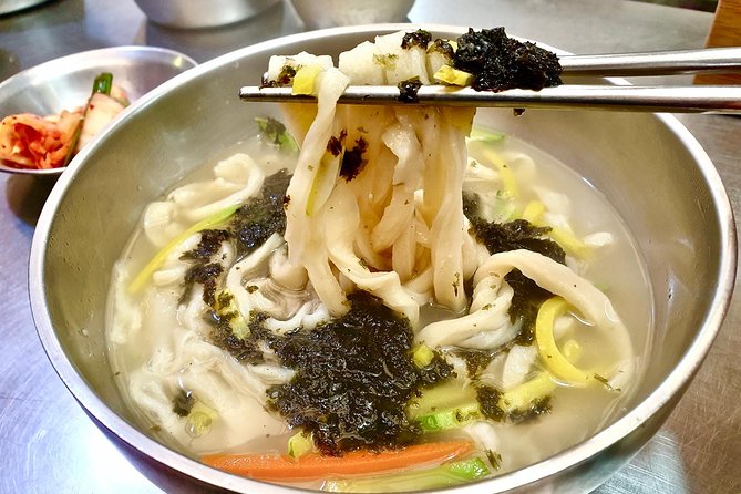 Private Downtown Seoul Food & Market Tour with 8+ Tastings - Namdaemun Market brings the food into daily life