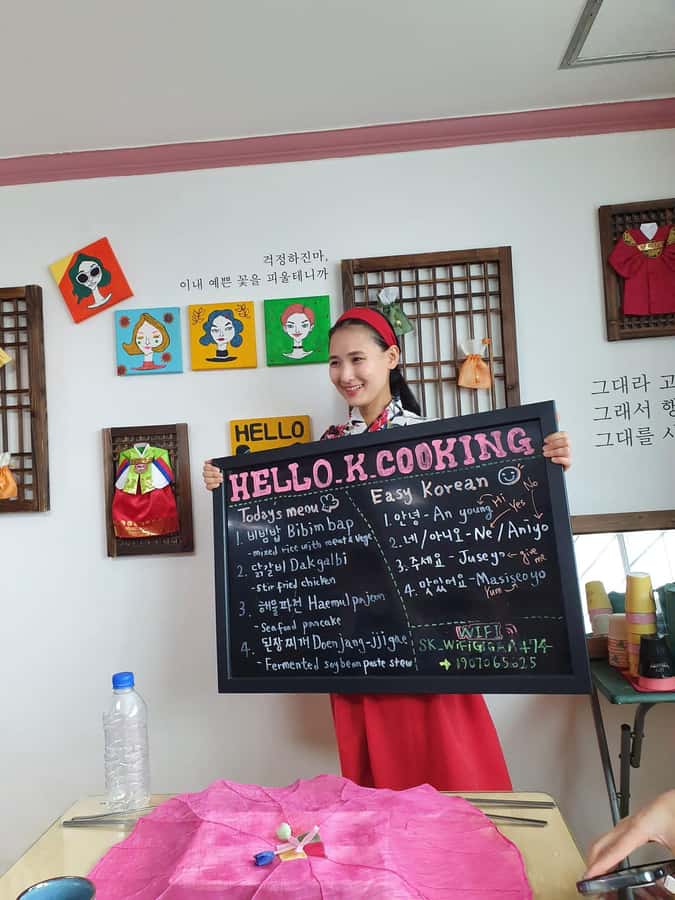 Seoul: Korean Cooking Class at a Local Home and Market Tour - Sitting down to Hanjeongsik after the work