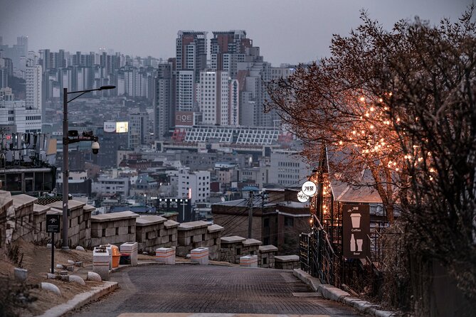 Seoul moonlight walking tour with local historian - Ihwa Mural Village and the social story behind the art