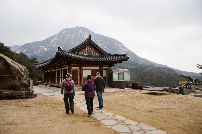 Seoul Mountain Hike: Temples, Folklore & Traditional Meal - The first ascent requires steady legs