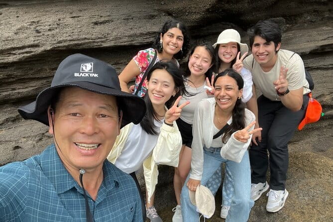 Small Group Tour East Jeju Cherry Blossom & Woman Diver Show - The women divers show at Umutgae Coast