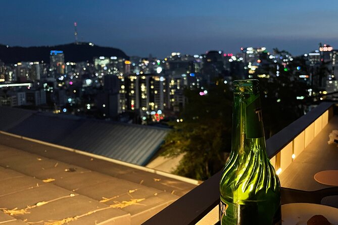 Sunset Walking Tour in Naksan Park with Dinner - Sunset views toward N Seoul Tower